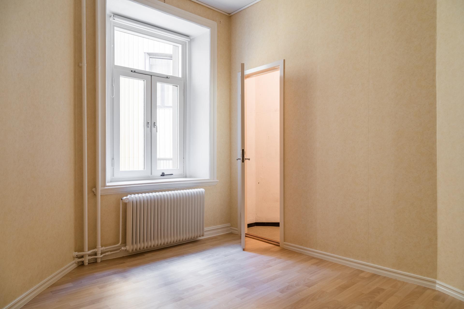 Lågupplöst Tyst beläget sovrum med vackert gjutjärnselement